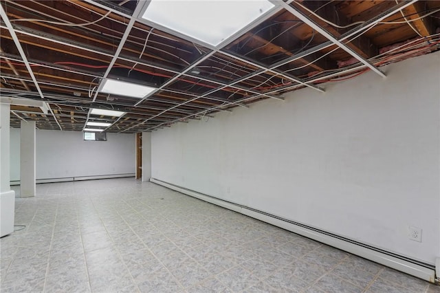 156 Davis Ave, Cranston, RI 02910 - below grade area with a baseboard heating unit and tile patterned floors