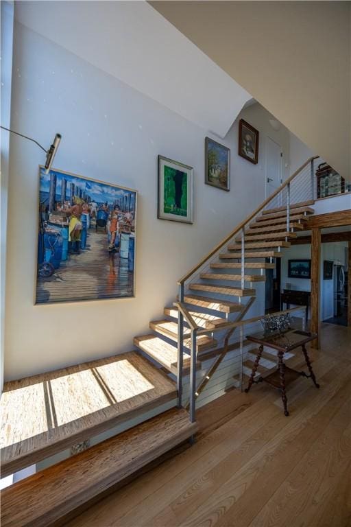 1448 Mohegan Trl, Block Island, RI 02807 - stairs featuring wood-type flooring