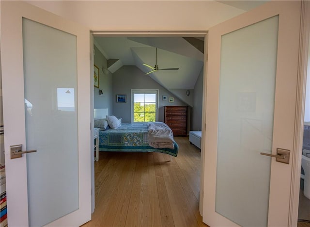 1448 Mohegan Trl, Block Island, RI 02807 - bedroom featuring hardwood / wood-style flooring, vaulted ceiling, and a ceiling fan