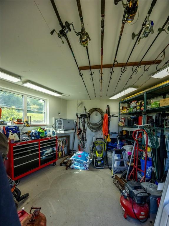 1448 Mohegan Trl, Block Island, RI 02807 - garage with a workshop area