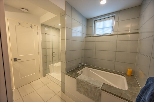 1448 Mohegan Trl, Block Island, RI 02807 - bathroom featuring a bath, a stall shower, and tile patterned flooring