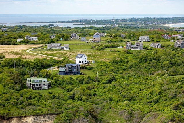 1448 Mohegan Trl, Block Island, RI 02807 - aerial view of a nearby body of water and a heavily wooded area