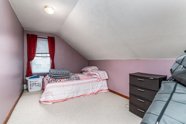 85 Herschel St, Providence, RI 02909 - carpeted bedroom featuring baseboards and vaulted ceiling