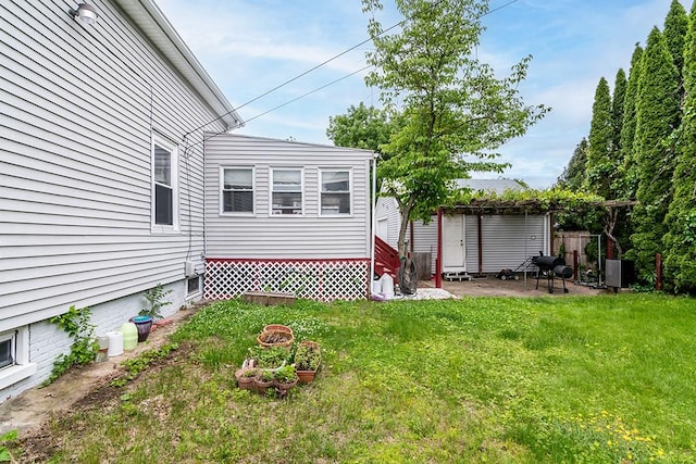 85 Herschel St, Providence, RI 02909 - view of green lawn with a patio area