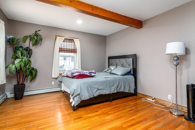 85 Herschel St, Providence, RI 02909 - bedroom with beam ceiling, light wood-style flooring, recessed lighting, and a baseboard radiator