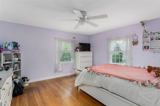 15 Metcalf Dr, Cumberland, RI 02864 - bedroom featuring multiple windows, wood finished floors, and ceiling fan