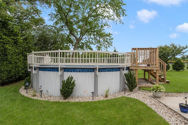 15 Metcalf Dr, Cumberland, RI 02864 - outdoor pool with a yard and a wooden deck