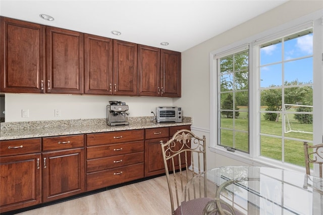 15 Metcalf Dr, Cumberland, RI 02864 - kitchen featuring light stone countertops, light wood-type flooring, and recessed lighting