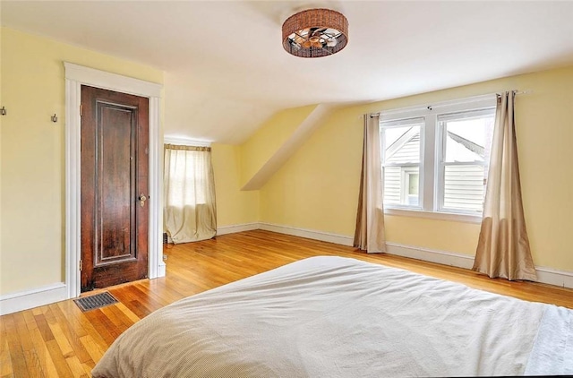 796 Pontiac Ave, Cranston, RI 02910 - bedroom featuring wood finished floors, lofted ceiling, and baseboards
