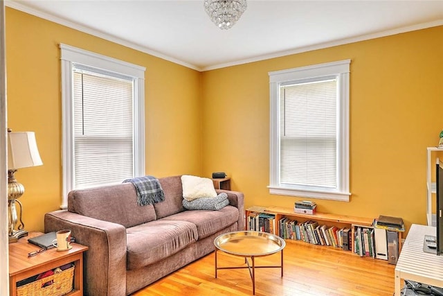796 Pontiac Ave, Cranston, RI 02910 - living room with healthy amount of natural light, wood finished floors, and ornamental molding