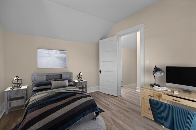 62 Fenner Ave, East Providence, RI 02915 - bedroom featuring light wood finished floors, vaulted ceiling, and baseboards