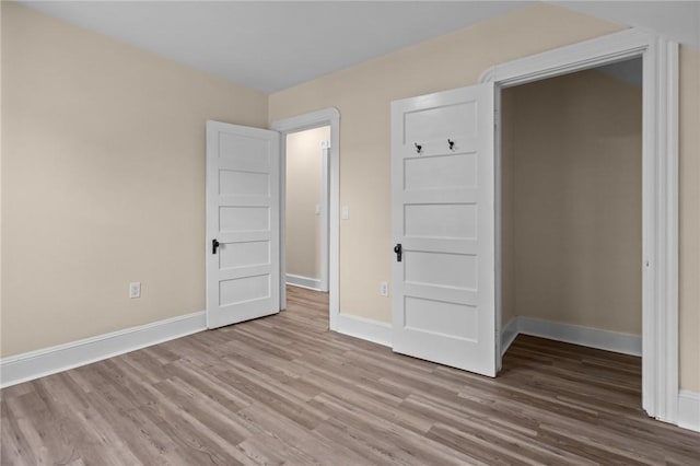 62 Fenner Ave, East Providence, RI 02915 - unfurnished bedroom featuring wood finished floors and baseboards