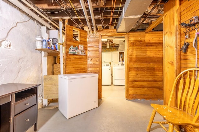 79 George Waterman Rd, Johnston, RI 02919 - unfinished basement with white fridge, wood walls, and washer and clothes dryer
