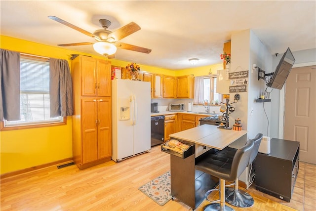 79 George Waterman Rd, Johnston, RI 02919 - kitchen with white refrigerator with ice dispenser, dishwasher, a sink, a peninsula, and light wood-style flooring