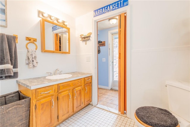 79 George Waterman Rd, Johnston, RI 02919 - half bath with toilet, vanity, and tile patterned flooring