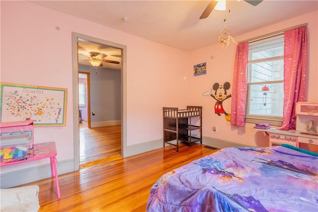 79 George Waterman Rd, Johnston, RI 02919 - bedroom with wood finished floors, multiple windows, baseboards, and a ceiling fan