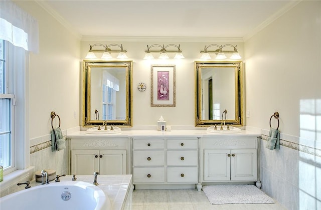 45 Burns Way E, Greenwich, RI 02818 - full bath with double vanity, a bathtub, a wainscoted wall, ornamental molding, and tile walls