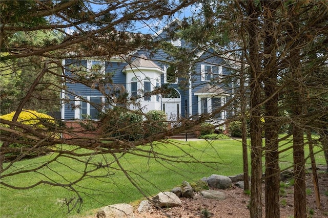 95 Pheasant Dr, East Greenwich, RI 02818 - view of property exterior featuring a lawn