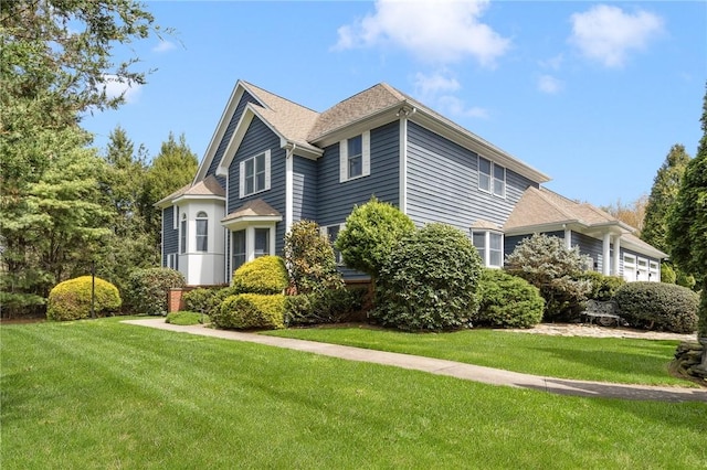 95 Pheasant Dr, East Greenwich, RI 02818 - view of front of house featuring a front yard