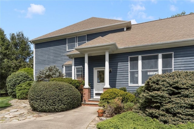 95 Pheasant Dr, East Greenwich, RI 02818 - view of front of house with a shingled roof