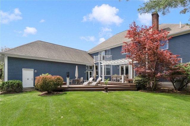 95 Pheasant Dr, East Greenwich, RI 02818 - back of house with a pergola, a chimney, a wooden deck, and a lawn