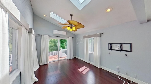 370 Ring Ave, Warwick, RI 02888 - unfurnished room featuring a skylight, vaulted ceiling, wood finished floors, baseboards, and ceiling fan
