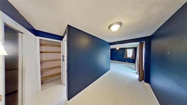 370 Ring Ave, Warwick, RI 02888 - corridor featuring carpet flooring, baseboards, and a textured ceiling