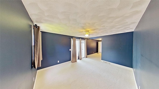 370 Ring Ave, Warwick, RI 02888 - carpeted empty room featuring a ceiling fan, a textured ceiling, and baseboards