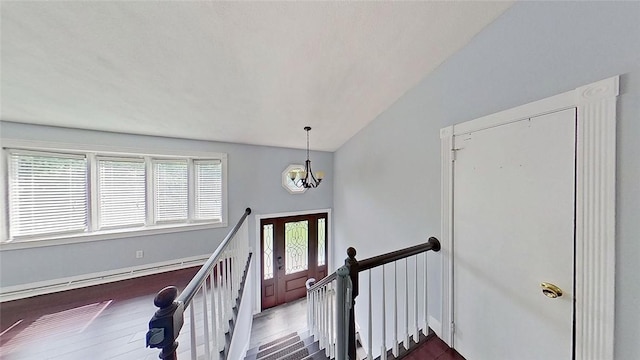 370 Ring Ave, Warwick, RI 02888 - staircase featuring a chandelier, healthy amount of natural light, lofted ceiling, and wood finished floors