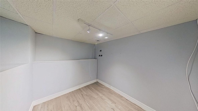 370 Ring Ave, Warwick, RI 02888 - empty room with track lighting, light wood-style floors, and baseboards