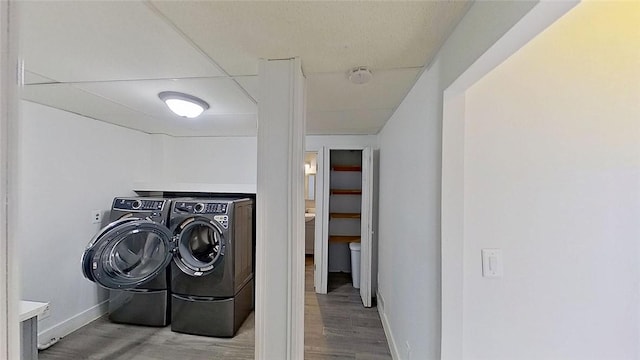 370 Ring Ave, Warwick, RI 02888 - laundry room featuring washer and clothes dryer, wood finished floors, and baseboards