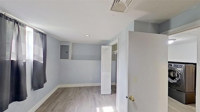 370 Ring Ave, Warwick, RI 02888 - hall with electric panel, wood finished floors, washer / clothes dryer, and baseboards