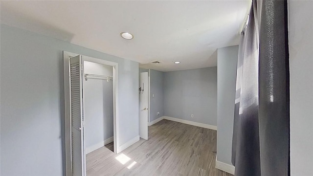 370 Ring Ave, Warwick, RI 02888 - unfurnished bedroom with light wood-style floors, baseboards, a closet, and recessed lighting