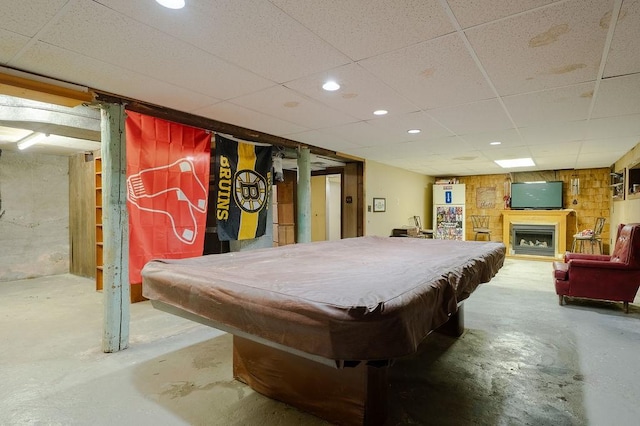 254 Jenckes St, Woonsocket, RI 02895 - recreation room featuring unfinished concrete flooring, billiards table, a fireplace, recessed lighting, and a drop ceiling