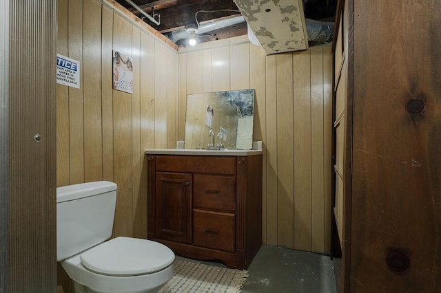254 Jenckes St, Woonsocket, RI 02895 - bathroom featuring toilet, wood walls, and vanity