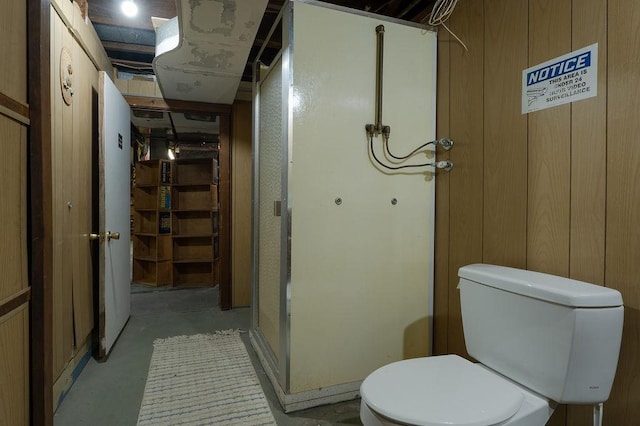 254 Jenckes St, Woonsocket, RI 02895 - full bathroom with unfinished concrete flooring, toilet, and a shower