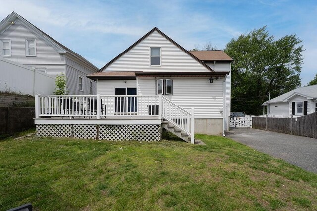 254 Jenckes St, Woonsocket, RI 02895 - rear view of property featuring a deck and asphalt driveway