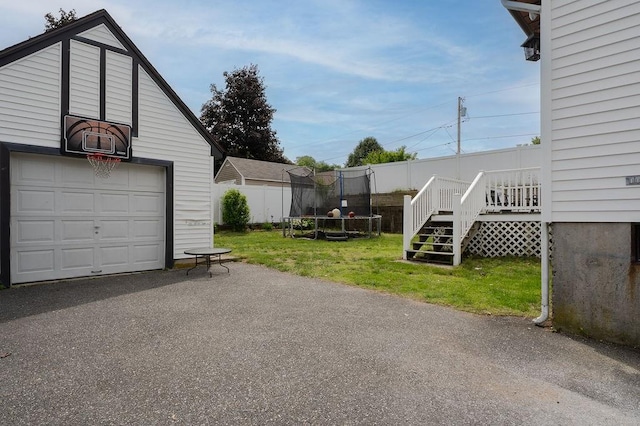 254 Jenckes St, Woonsocket, RI 02895 - detached garage featuring a trampoline