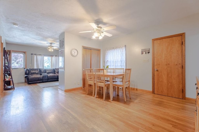 254 Jenckes St, Woonsocket, RI 02895 - dining space featuring a ceiling fan, light wood-style flooring, and baseboards