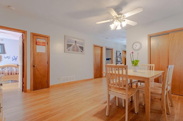 254 Jenckes St, Woonsocket, RI 02895 - dining room featuring light wood-type flooring and a ceiling fan