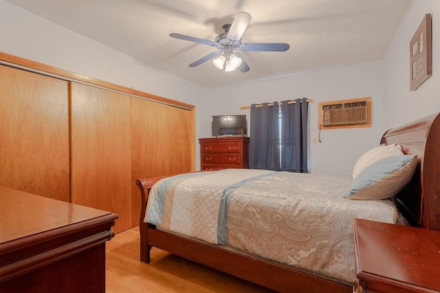 254 Jenckes St, Woonsocket, RI 02895 - bedroom with a closet, a wall mounted air conditioner, light wood finished floors, and ceiling fan