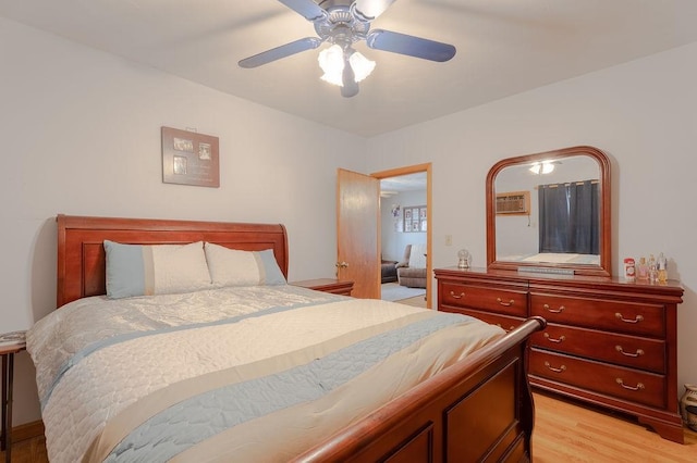 254 Jenckes St, Woonsocket, RI 02895 - bedroom with light wood-style flooring, a wall mounted AC, and a ceiling fan