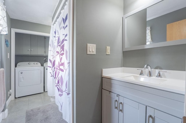 254 Jenckes St, Woonsocket, RI 02895 - bathroom featuring vanity, washing machine and clothes dryer, tile patterned floors, and a shower with curtain