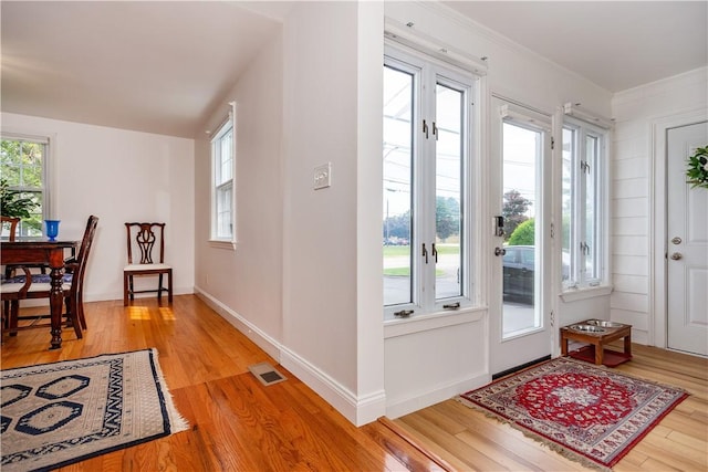 170 Pilgrim Pkwy, Warwick, RI 02888 - foyer featuring light wood-type flooring, baseboards, and ornamental molding