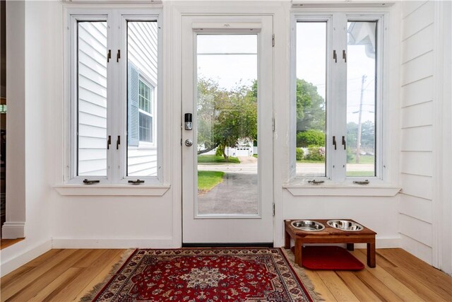 170 Pilgrim Pkwy, Warwick, RI 02888 - entryway featuring light wood finished floors and baseboards