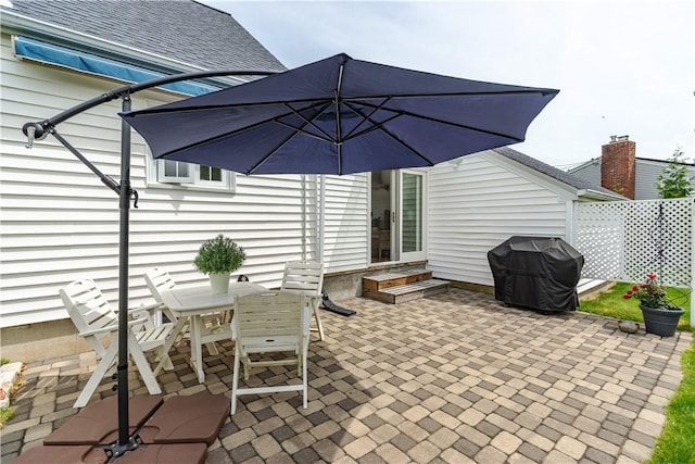 170 Pilgrim Pkwy, Warwick, RI 02888 - view of patio featuring grilling area, entry steps, and outdoor dining space