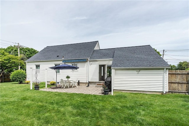 170 Pilgrim Pkwy, Warwick, RI 02888 - back of property featuring a patio and a shingled roof