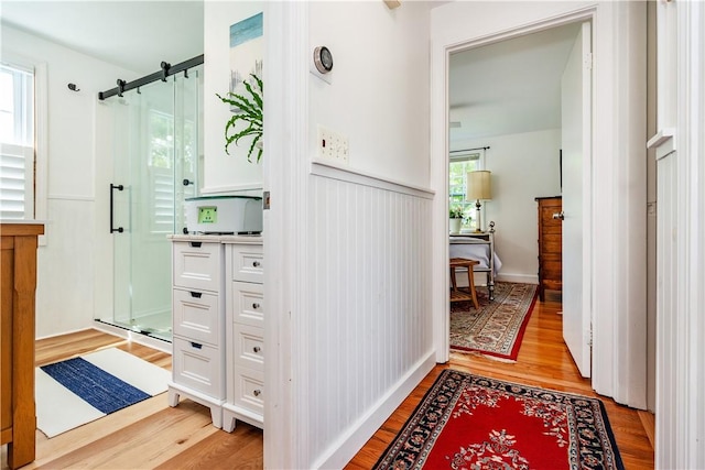 170 Pilgrim Pkwy, Warwick, RI 02888 - corridor featuring light wood finished floors and a wainscoted wall