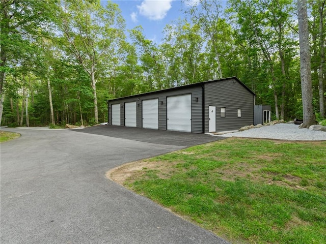 511 Central Pike, Scituate, RI 02857 - detached garage featuring asphalt driveway