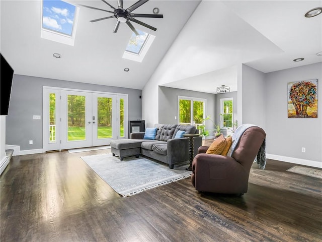511 Central Pike, Scituate, RI 02857 - living area featuring high vaulted ceiling, a skylight, baseboards, wood finished floors, and a ceiling fan